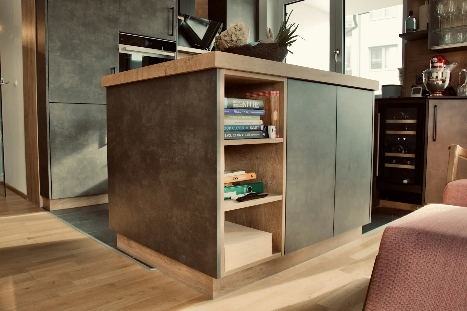 Under-counter wine cooler in modern kitchen bar area
